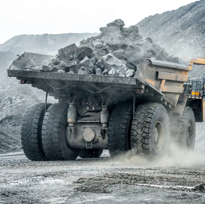 Haul truck operating in a dusty mine environment